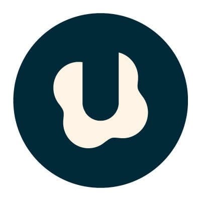 A dark blue circle with a cream-colored abstract "U" shape in the center.