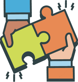 Two hands are each holding a puzzle piece, one green and one orange, and fitting them together.
